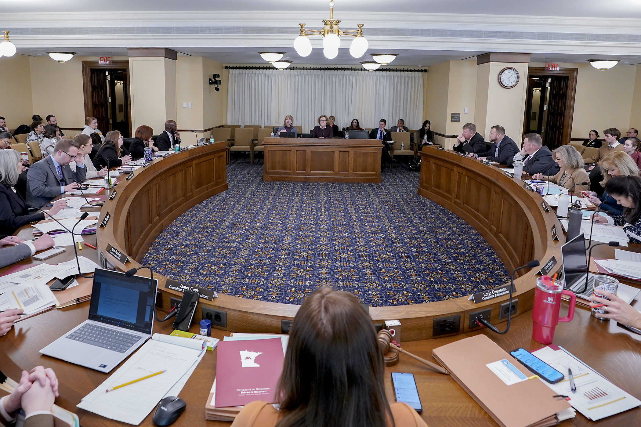 University of Minnesota officials present an overview of the university’s request for a $265 million funding increase during a Feb. 20 meeting of the House Higher Education Finance and Policy Committee. (Photo by Michele Jokinen)