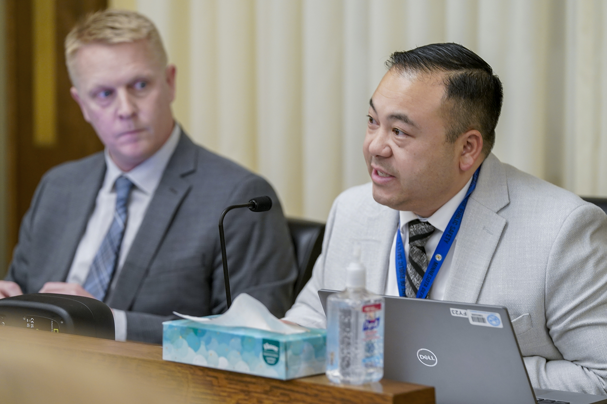 Pong Xiong, director of the Department of Public Safety’s Driver and Vehicle Services Division, shares concerns about HF795. Sponsored by Rep. Andrew Myers, left, the bill would amend driver’s road testing requirements. (Photo by Michele Jokinen)