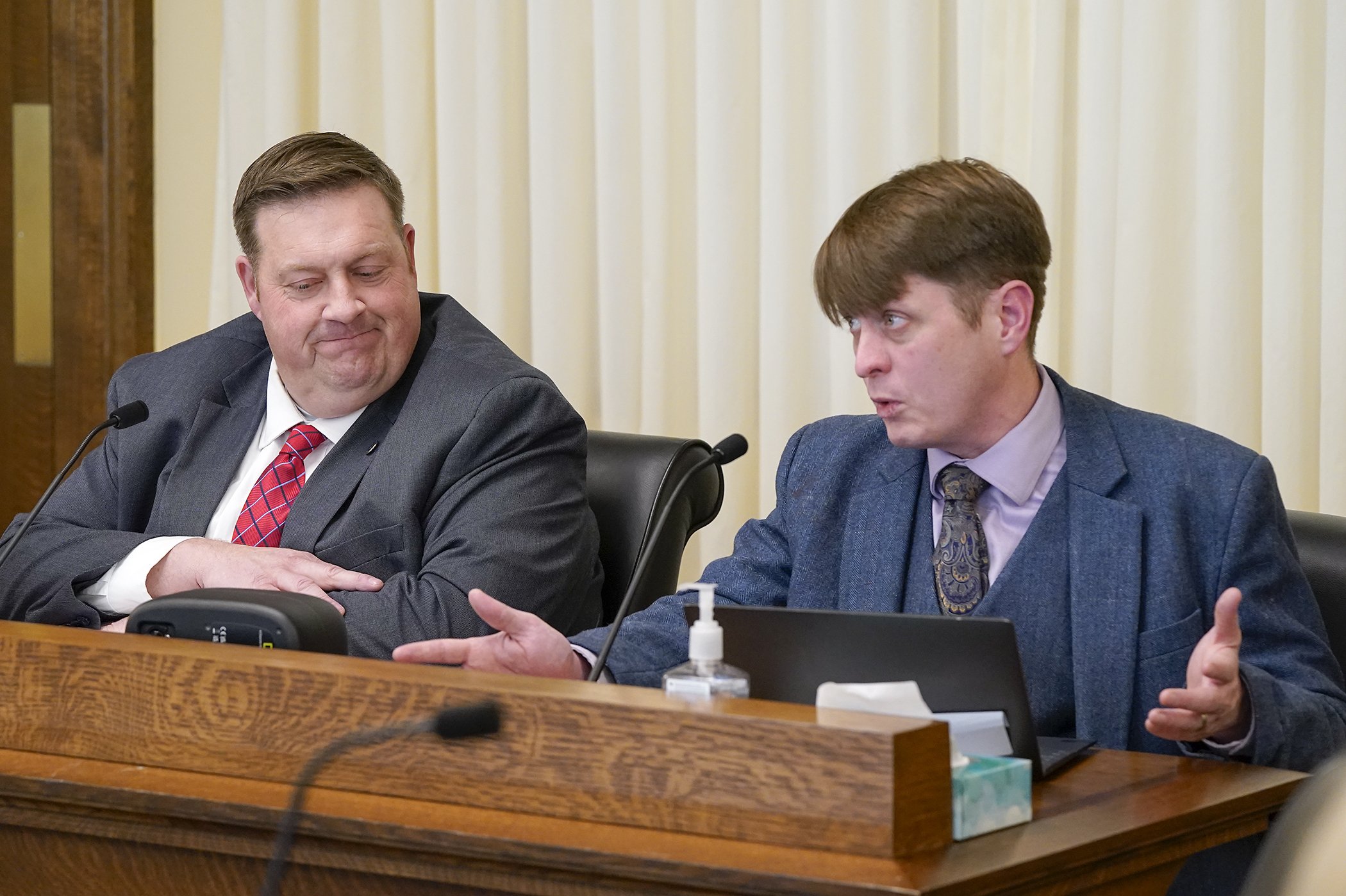 Graham Berg-Moberg, in-house counsel for the Minnesota Association of Townships, testifies before the House transportation committee March 5 in support of HF1463 that would provide $70 million in town road and bridge funding. Rep. Keith Allen, left, sponsors the bill. (Photo by Michele Jokinen)